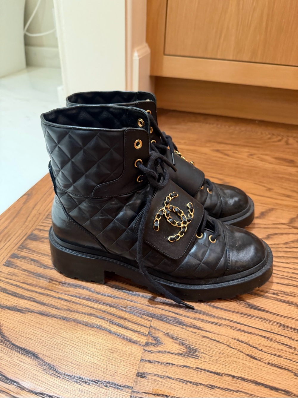 CHANEL Black Quilted Leather Lace-Up Boots with Gold CC Accent - Picture 2 of 5